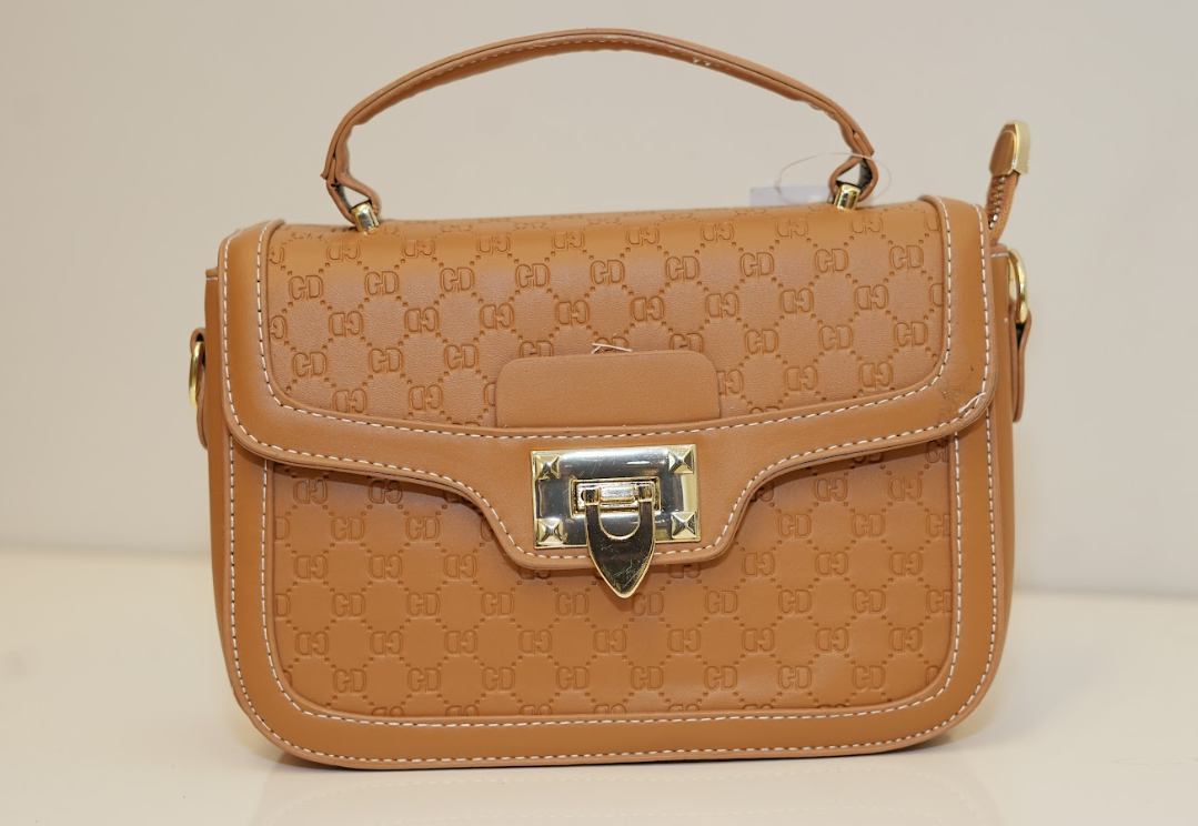 Saddle Monogram Lock Bag – Royal Amber Edition