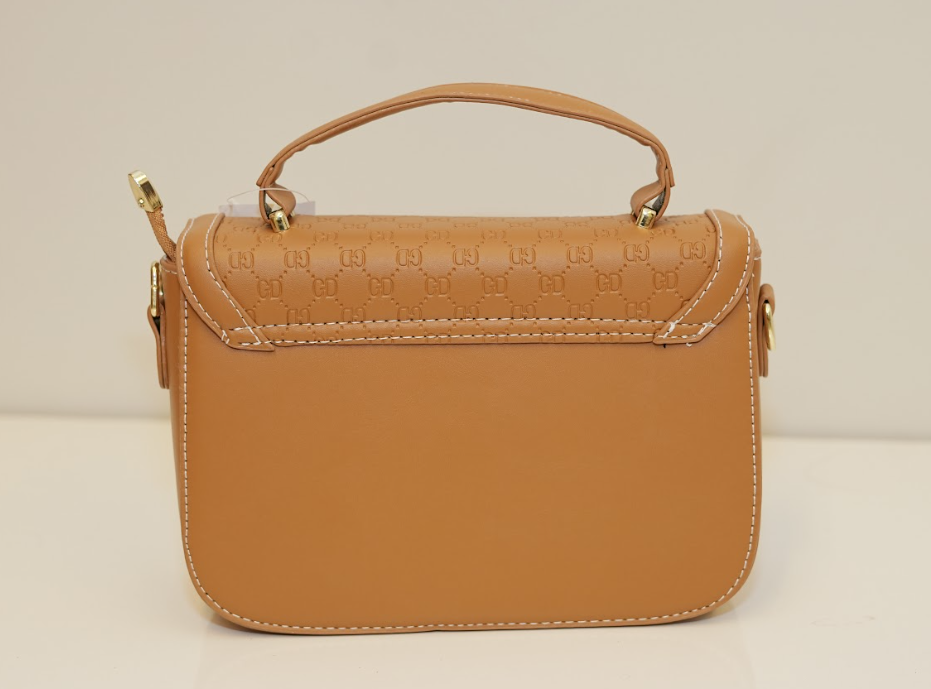 Saddle Monogram Lock Bag – Royal Amber Edition