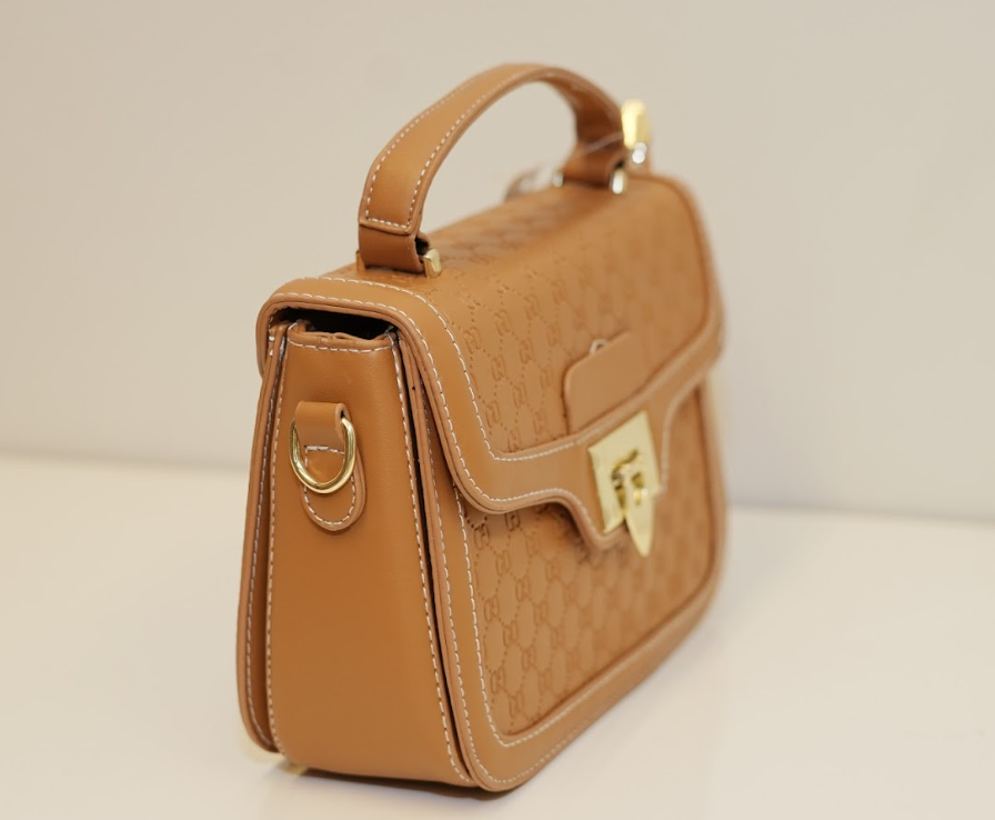 Saddle Monogram Lock Bag – Royal Amber Edition
