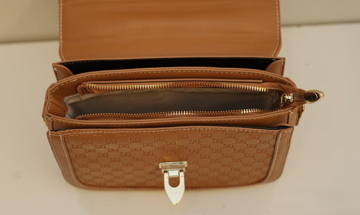 Saddle Monogram Lock Bag – Royal Amber Edition